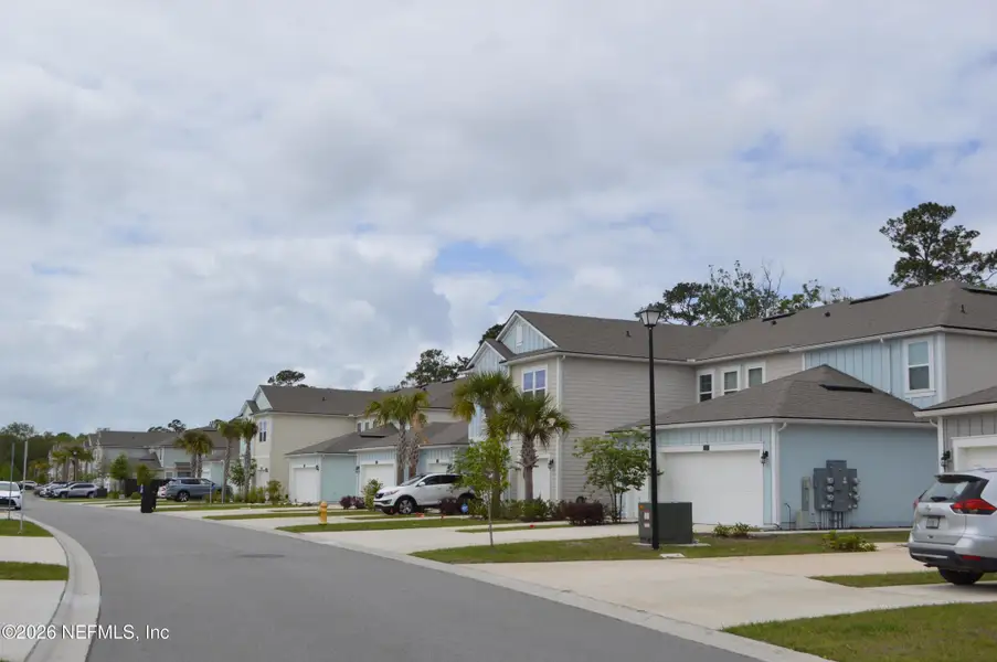 Front exterior of a new home in , St. Augustine, FL, highlighting curb appeal (Image 14).