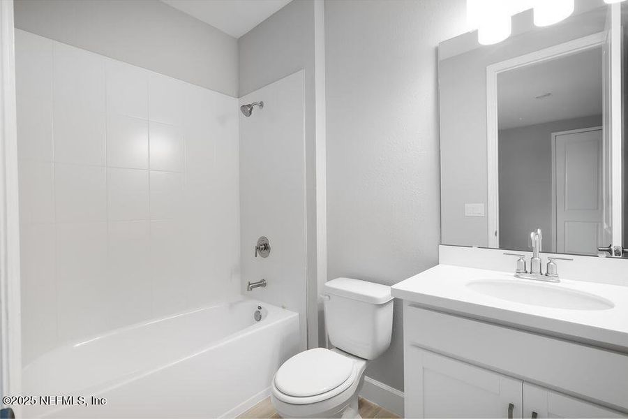 Furnished interior view inside a new home in Colbert Landings, Palm Coast (Image 9).