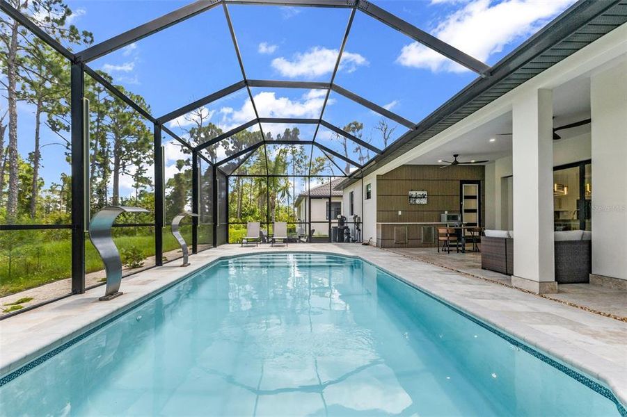 Exterior details and patio area of a home in , North Port (Image 24).