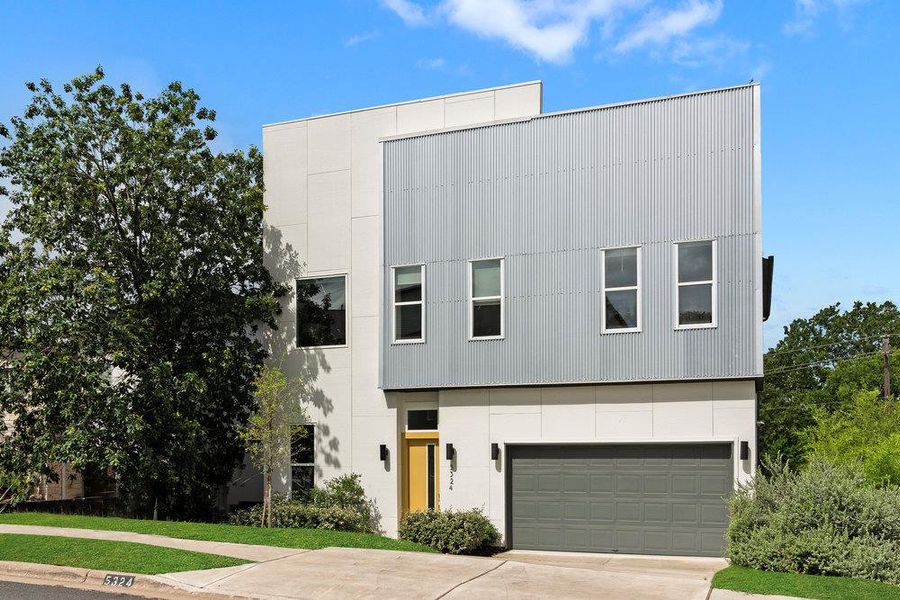 Front exterior of a new home in Agave, Austin, TX, highlighting curb appeal (Image 2).