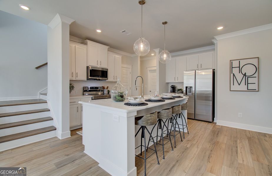 Furnished interior view inside a new home in The Towns at Auburn Station West, Auburn (Image 5).