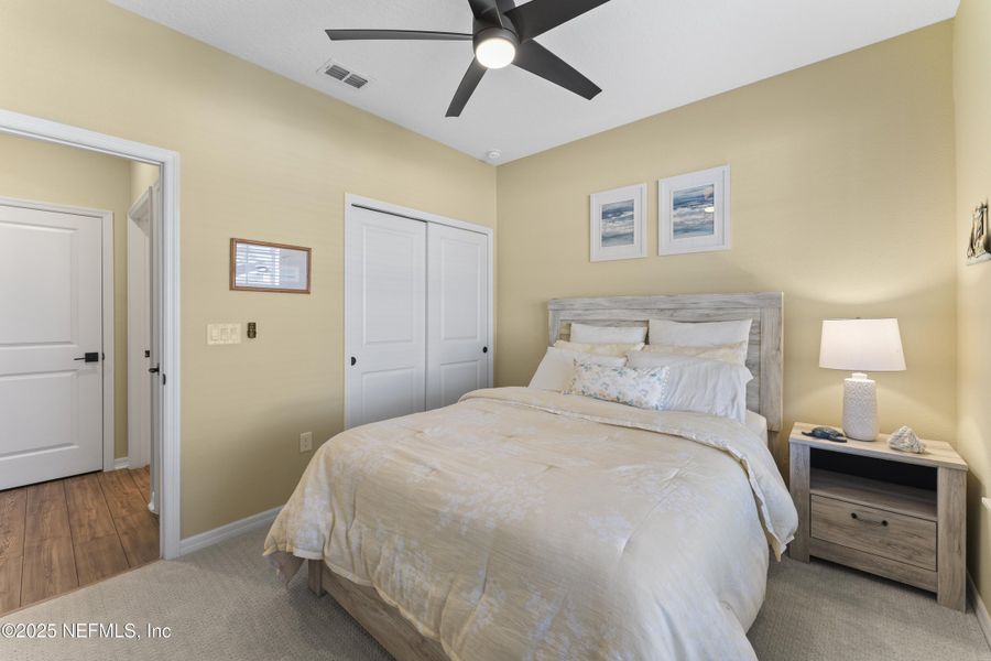Furnished interior view inside a new home in Summer Bay at Grand Oaks, St. Augustine (Image 12).