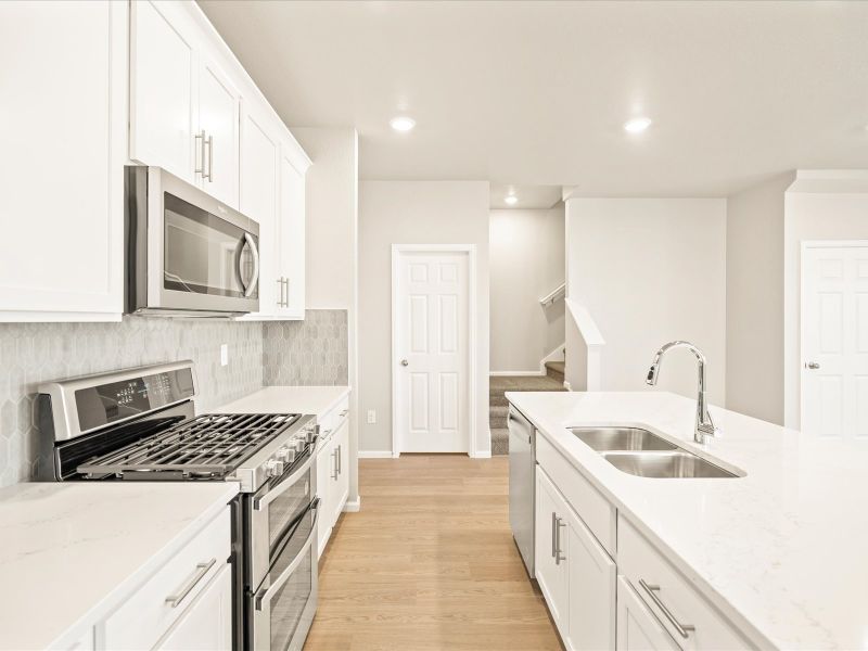 The Breckenridge floorplan interior image taken at a Meritage Homes community in Berthoud, CO.