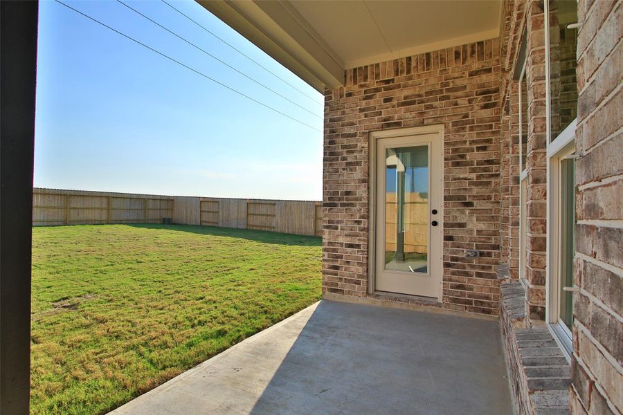 Exterior details and patio area of a home in Creekhaven, Arcola (Image 2).