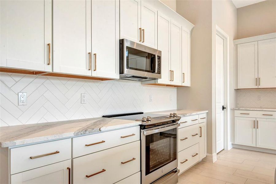Furnished interior view inside a new home in The Reserve at Victoria, Deland (Image 11).