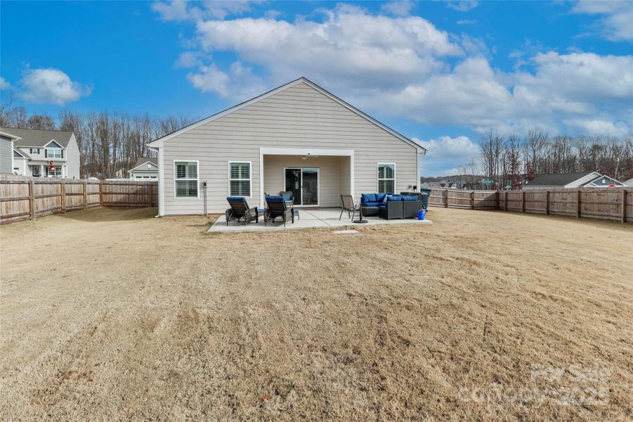 Exterior details and patio area of a home in Colonial Crossing, Troutman (Image 23). Exterior details and patio area of a home in Colonial Crossing, Troutman (Image 23).