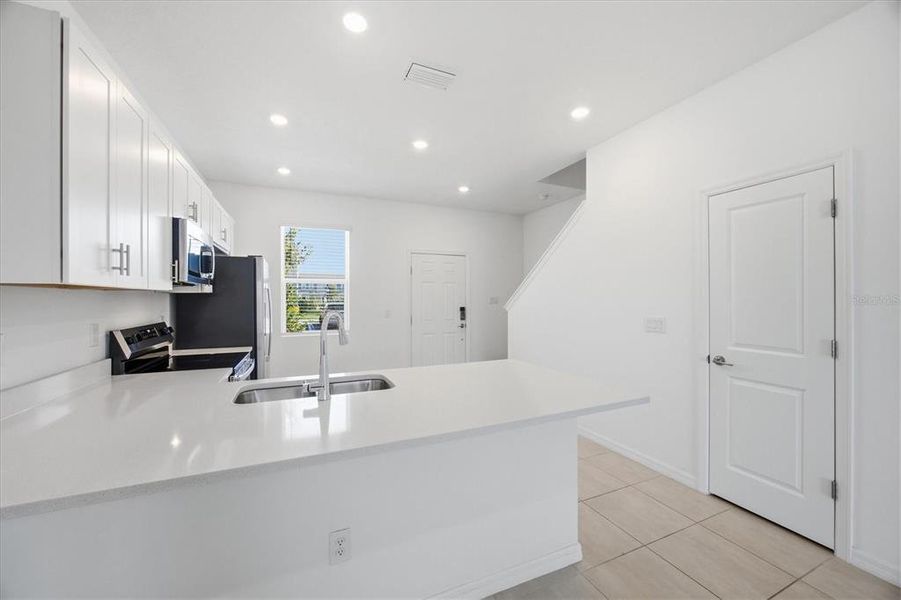 Furnished interior view inside a new home in , Sarasota (Image 11).