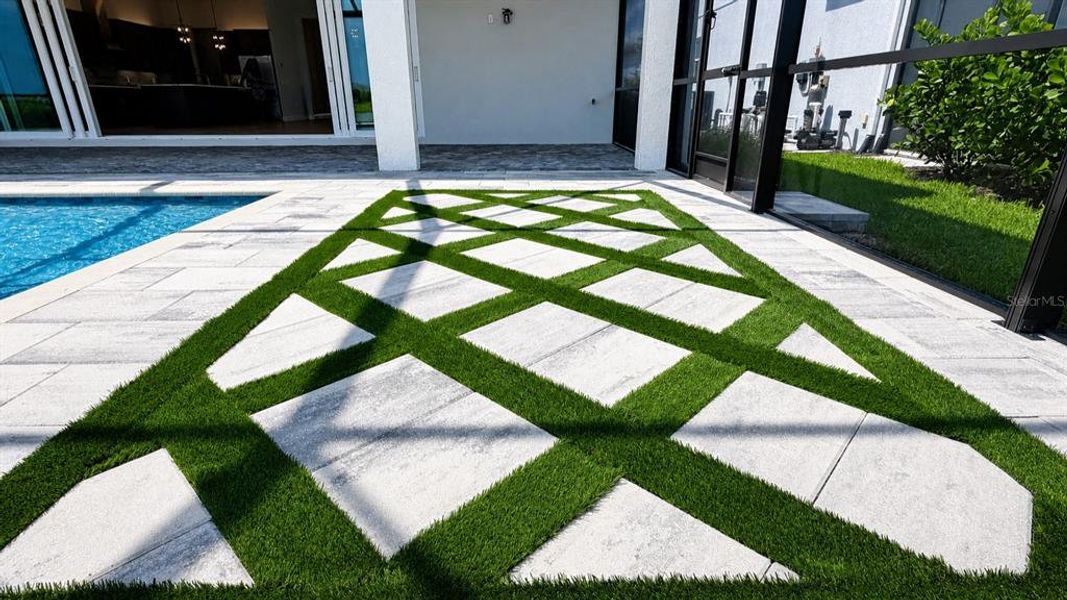 Exterior details and patio area of a home in Shellstone at Waterside, Sarasota (Image 28). Exterior details and patio area of a home in Shellstone at Waterside, Sarasota (Image 28).