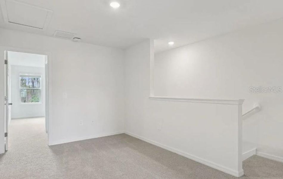 Spacious, unfurnished interior of a new home in Cagan Crossings West, Clermont (Image 8).