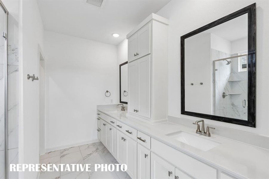 This luxurious owner's bath was designed for two!  REPRESENTATIVE PHOTO