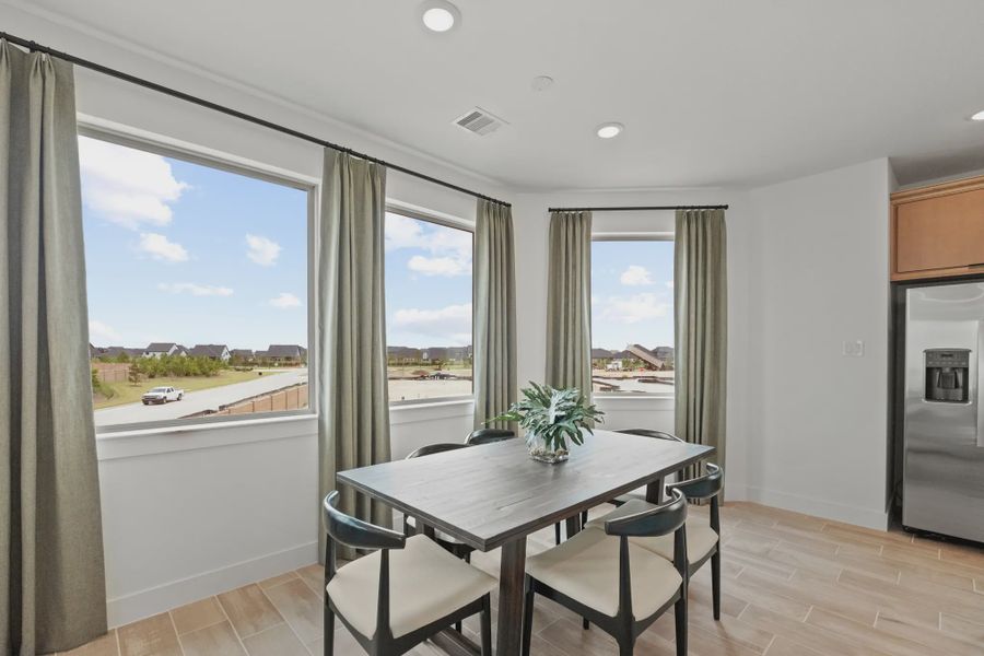 Representative furnished interior of a home built from the Oakdale by Chesmar Homes in Bridgeland, Elgin (Image 15).
