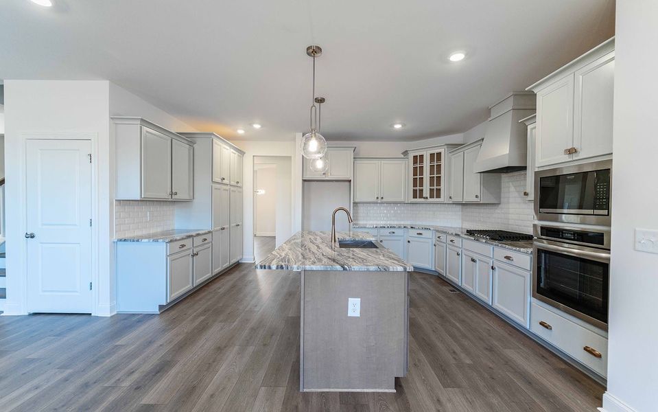 Furnished interior view inside a new home in Aden Woods, Fairview (Image 4).