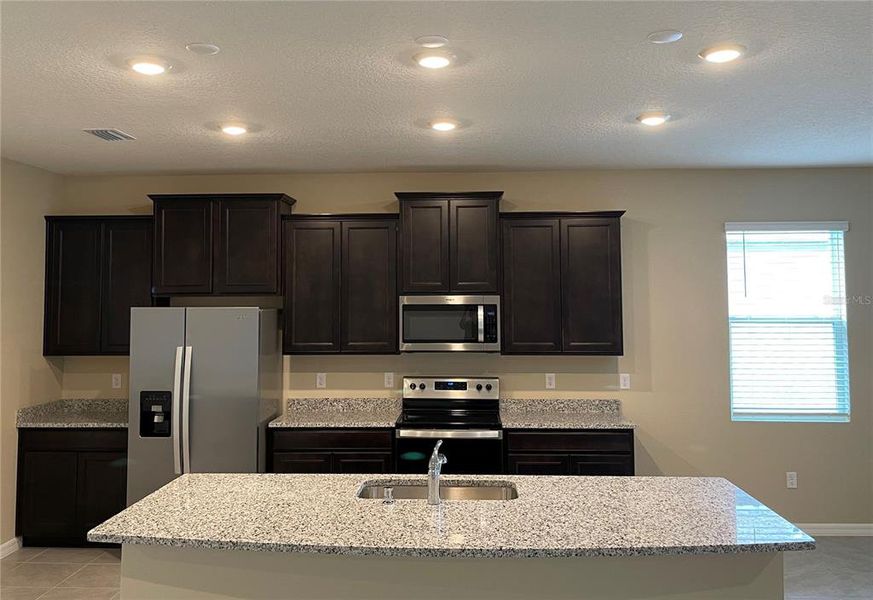 Furnished interior view inside a new home in , Dade City (Image 12).