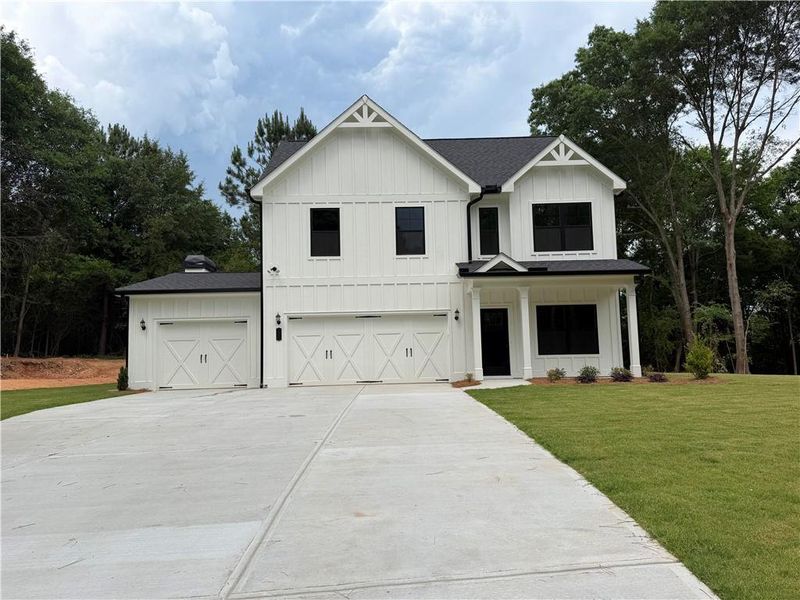 Front exterior of a new home in , Jefferson, GA, highlighting curb appeal (Image 25).