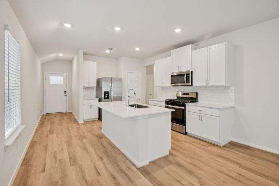 Furnished interior view inside a new home in Granger Pointe - Traditional Series, Conroe (Image 6).