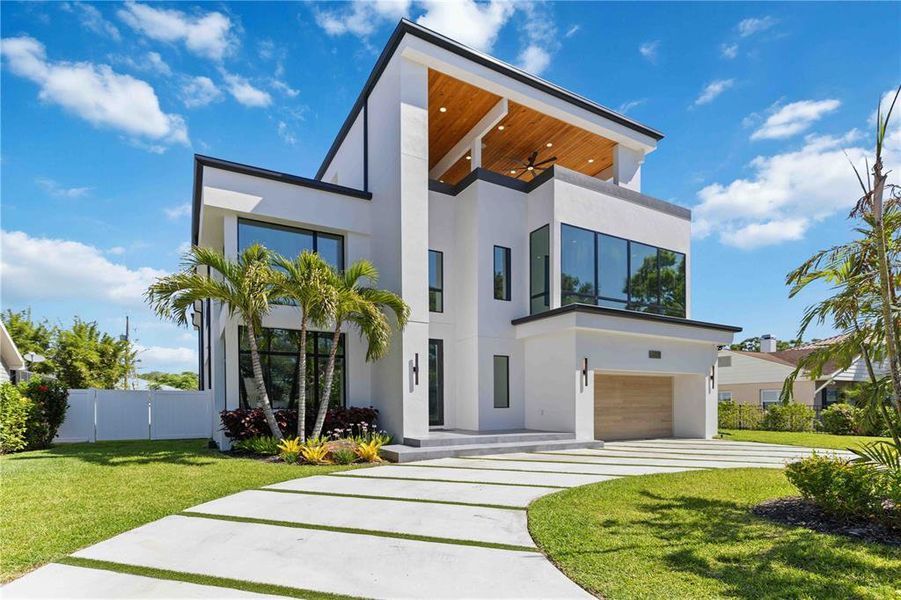 Front exterior of a new home in , Tampa, FL, highlighting curb appeal (Image 23).
