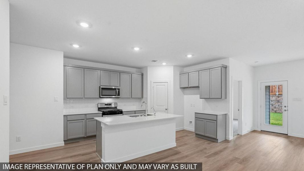 Furnished interior view inside a new home in Sunterra, Katy (Image 3).
