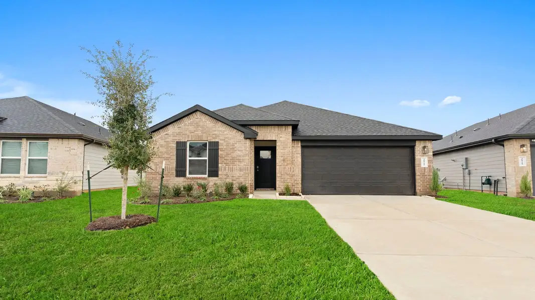 Front exterior of a new home in Emberly, Beasley, TX, highlighting curb appeal (Image 1). Front exterior of a new home in Emberly, Beasley, TX, highlighting curb appeal (Image 1).