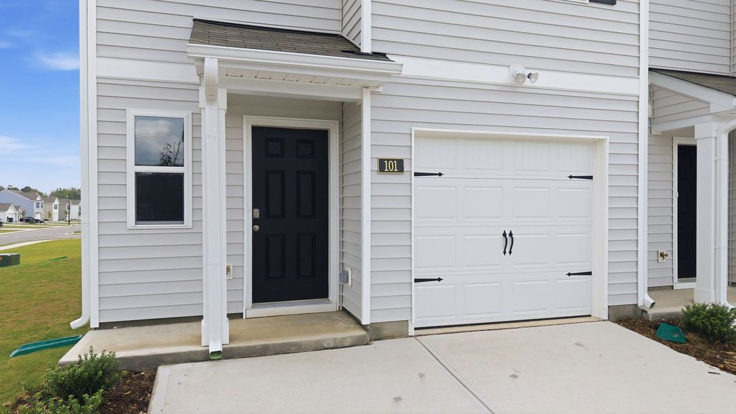 Exterior details and patio area of a home in The Townes at Hunter Hill, Rocky Mount (Image 2). Exterior details and patio area of a home in The Townes at Hunter Hill, Rocky Mount (Image 2).