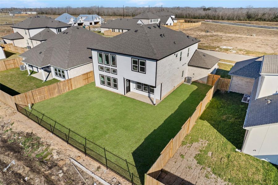Exterior details and patio area of a home in , Manvel (Image 27).