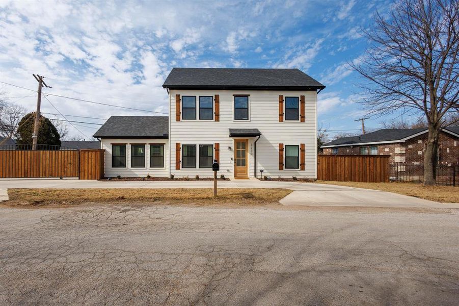 View of front of property with a shingled roof View of front of property with a shingled roof