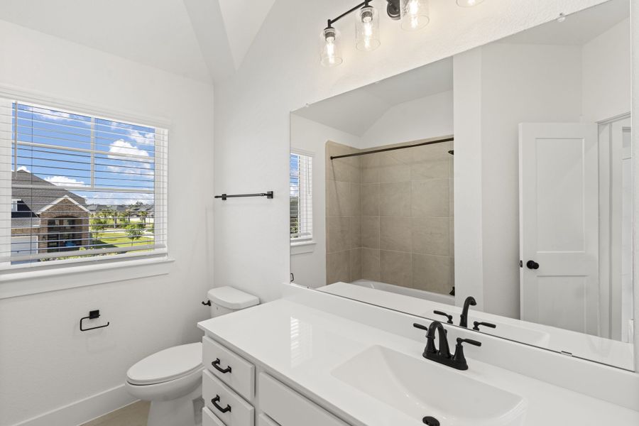 Furnished interior view inside a new home in The Woodlands Hills, Willis (Image 15).