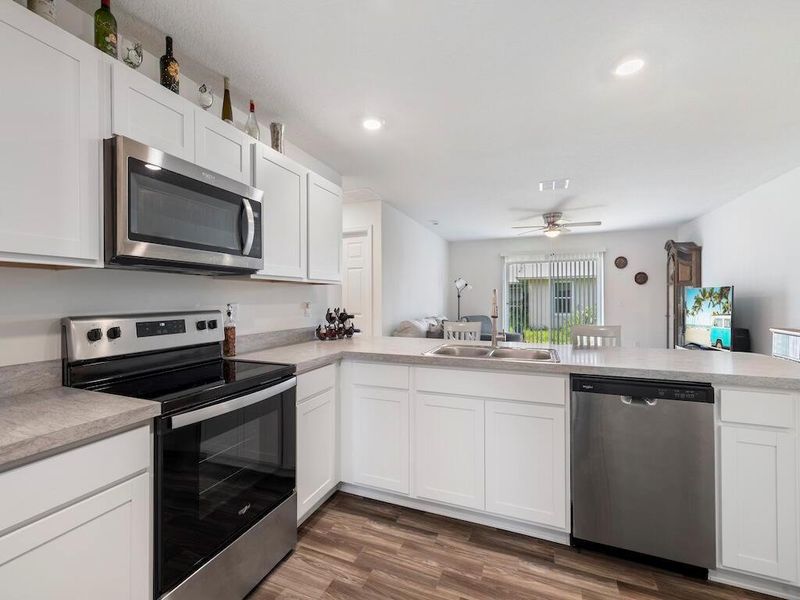 Furnished interior view inside a new home in , Port St. Lucie (Image 16).