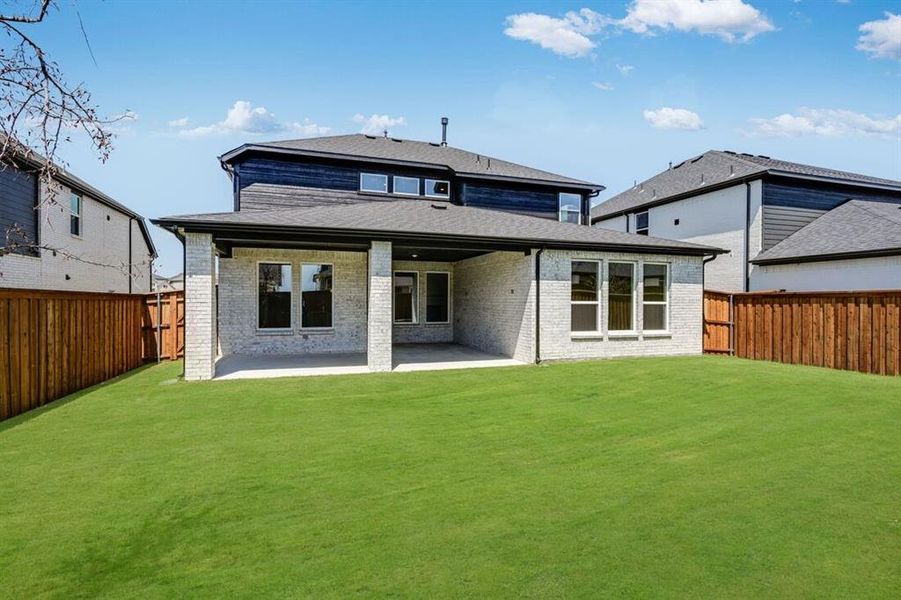 Front exterior of a new home in Highland Lakes 50s, McKinney, TX, highlighting curb appeal (Image 1). Front exterior of a new home in Highland Lakes 50s, McKinney, TX, highlighting curb appeal (Image 1).