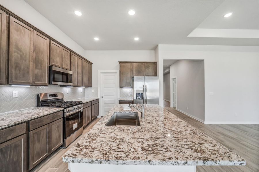 Furnished interior view inside a new home in Windmill Estates, Magnolia (Image 6).