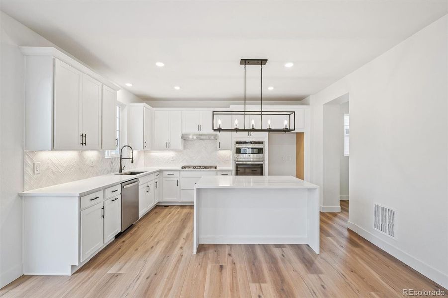 Furnished interior view inside a new home in Windsong, Thornton (Image 15).
