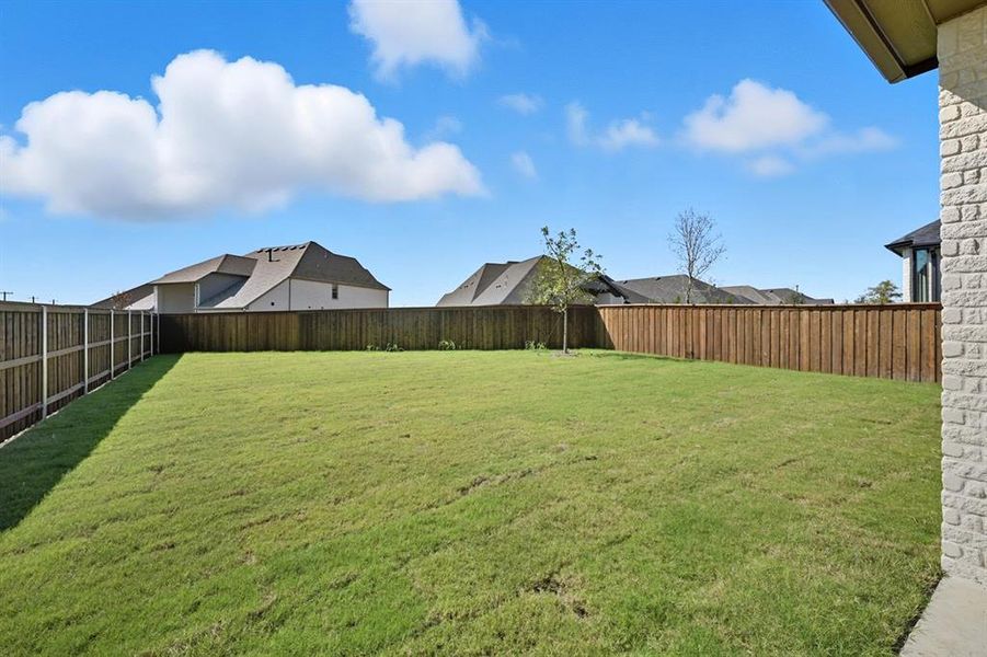 Exterior details and patio area of a home in Trinity Falls, McKinney (Image 2). Exterior details and patio area of a home in Trinity Falls, McKinney (Image 2).