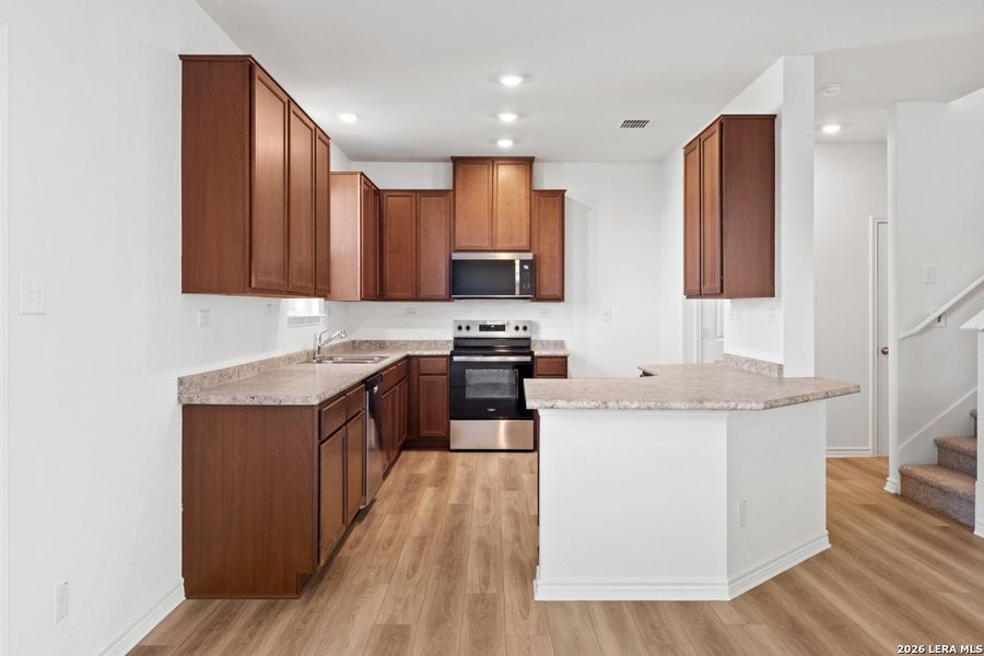 Furnished interior view inside a new home in The Granary - Heritage Collection, San Antonio (Image 11).