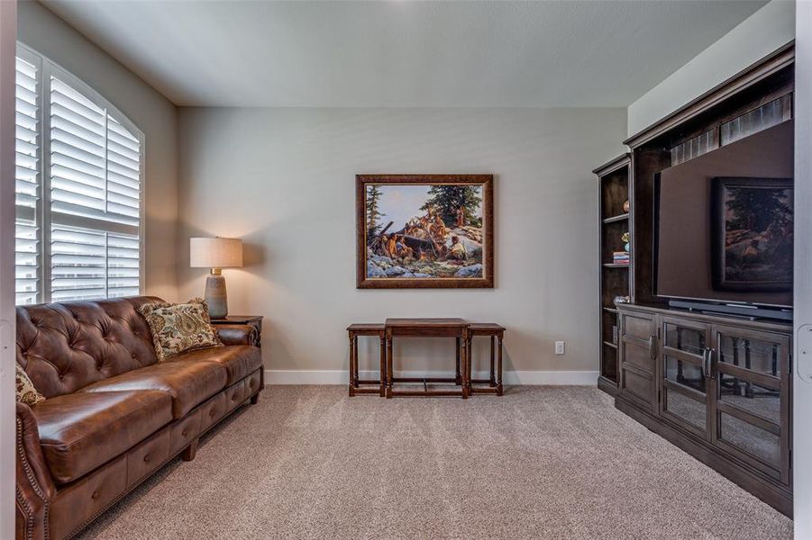 The large office can double as a den