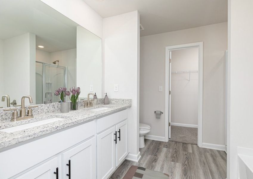 Get ready for your day in the master bathroom