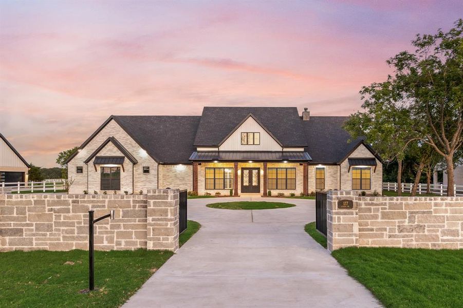 Front exterior of a new home in , McLendon-Chisholm, TX, highlighting curb appeal (Image 21). Front exterior of a new home in , McLendon-Chisholm, TX, highlighting curb appeal (Image 21).