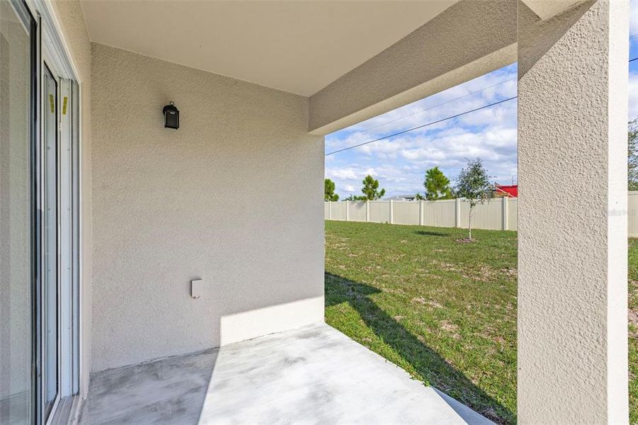 Exterior details and patio area of a home in The Grove at Scenic Terrace, Lake Hamilton (Image 7).