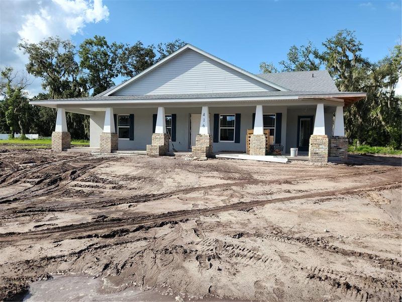 Front exterior of a new home in , Plant City, FL, highlighting curb appeal (Image 1). Front exterior of a new home in , Plant City, FL, highlighting curb appeal (Image 1).