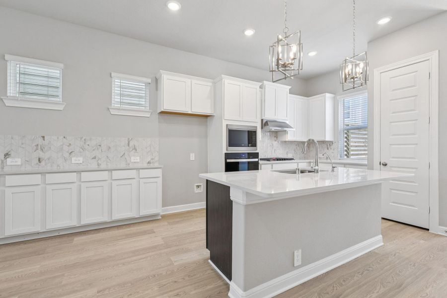 Furnished interior view inside a new home in Kemah Crossing - Luxe Series, Kemah (Image 14). Furnished interior view inside a new home in Kemah Crossing - Luxe Series, Kemah (Image 14).