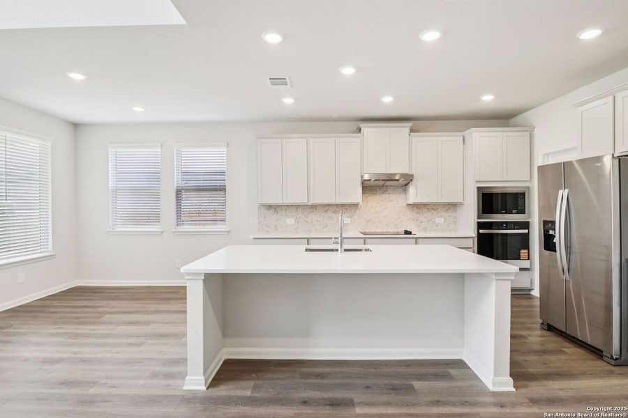 Furnished interior view inside a new home in Fox Falls, Boerne (Image 6).