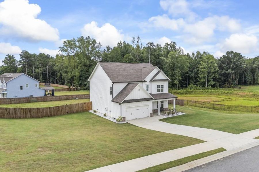 Front exterior of a new home in , Winder, GA, highlighting curb appeal (Image 22).
