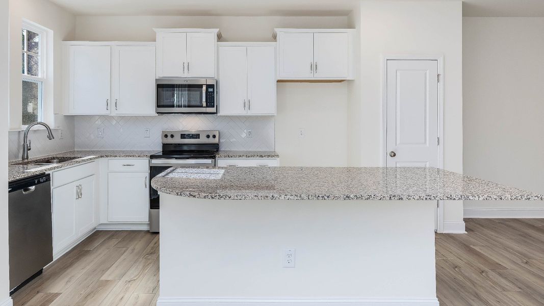 Furnished interior view inside a new home in Battle Bridge, Raleigh (Image 6).
