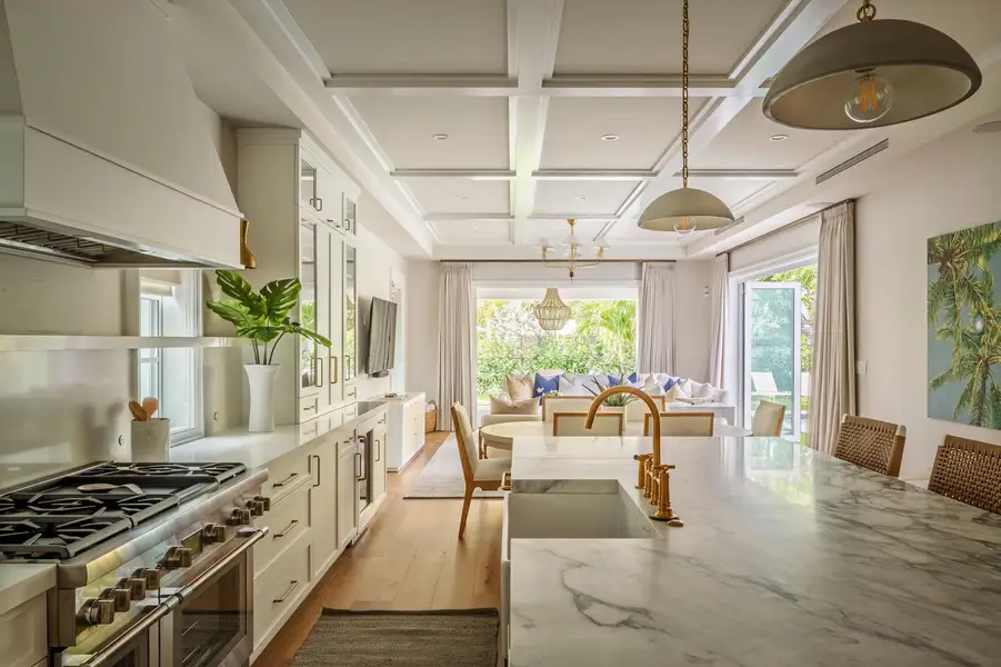15 - White kitchen with marble waterfall