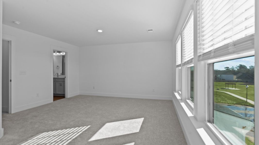 Highly skilled design shines in this elegant, restful primary suite near Downtown Simpsonville