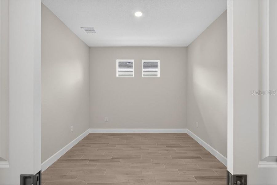 Spacious, unfurnished interior of a new home in Esplanade at Wiregrass Ranch, Wesley Chapel (Image 22).