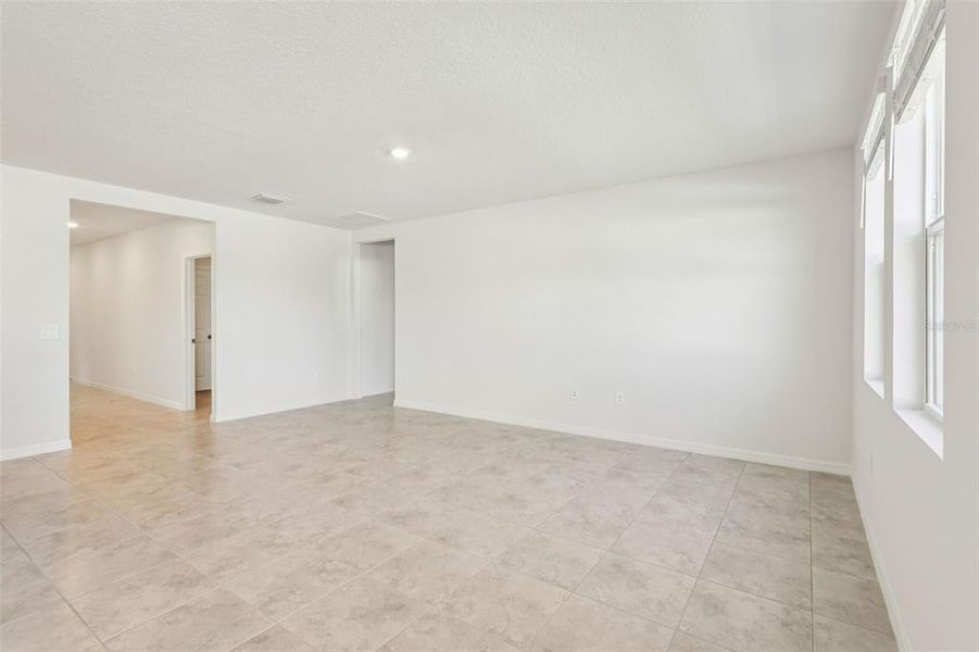 Spacious, unfurnished interior of a new home in Bradbury Creek - Signature Series, Haines City (Image 26).