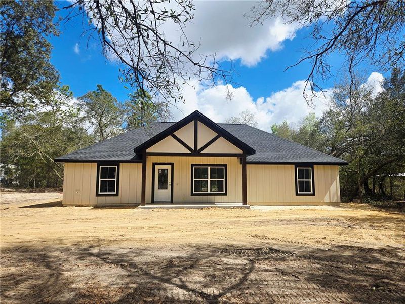 Exterior details and patio area of a home in , Bronson (Image 3).