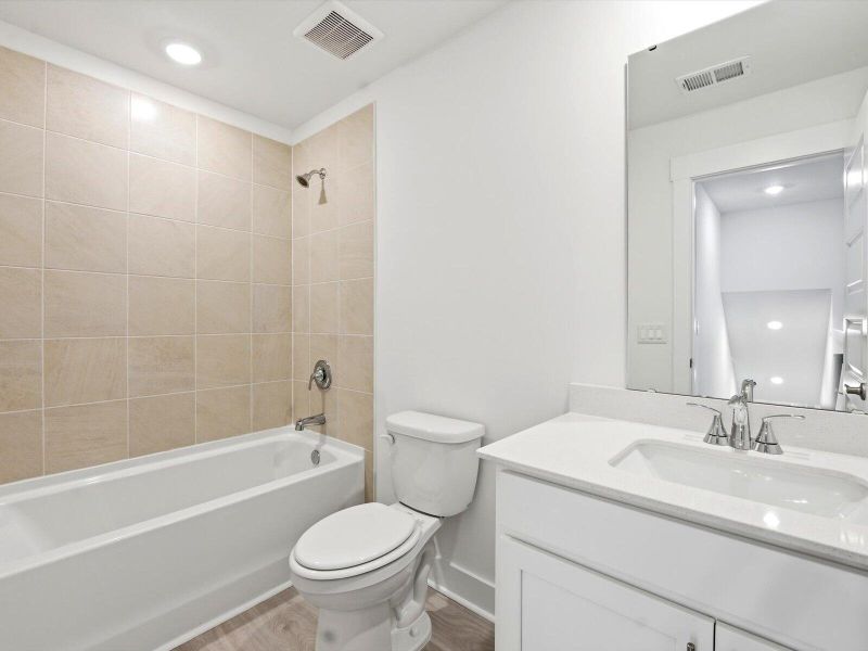 Furnished interior view inside a new home in The Coves at Lakes of Cane Bay, Summerville (Image 9).