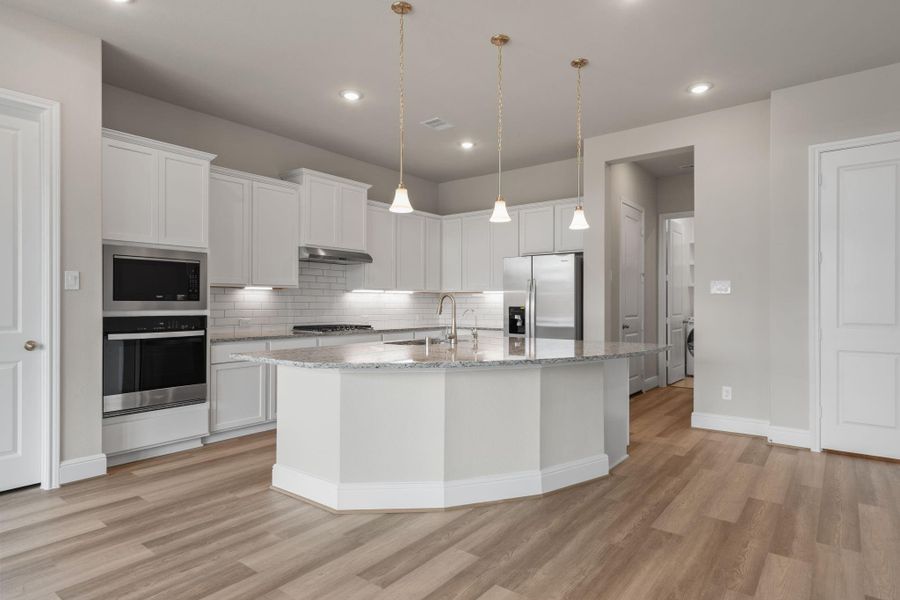 Furnished interior view inside a new home in Coastal Point, League City (Image 11).