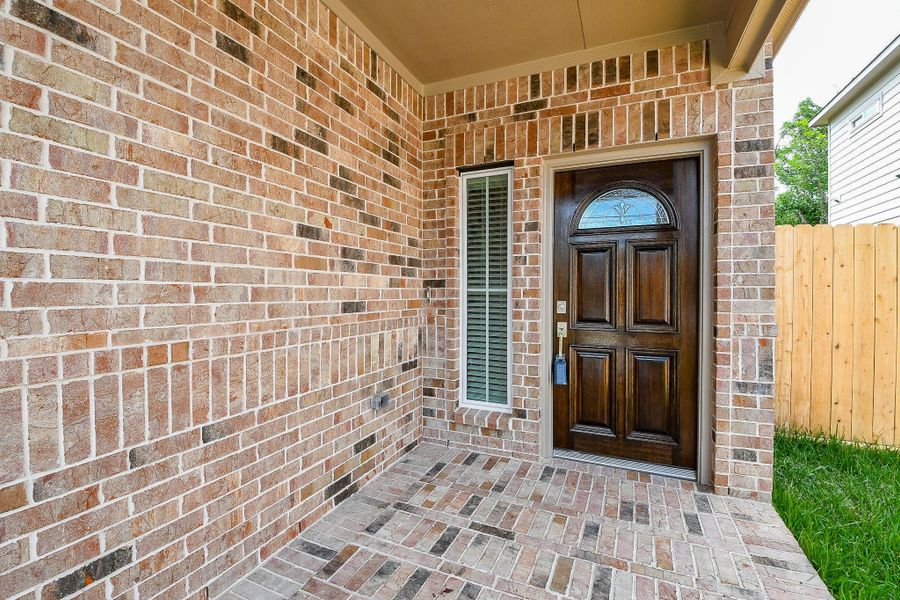Exterior details and patio area of a home in , Houston (Image 4). Exterior details and patio area of a home in , Houston (Image 4).