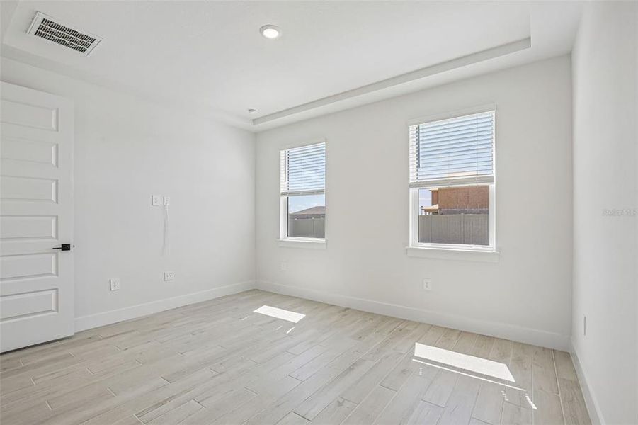 Spacious, unfurnished interior of a new home in Magnolia Bay - Reserve Series, Nokomis (Image 24).